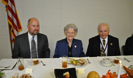 Members enjoy a meal together